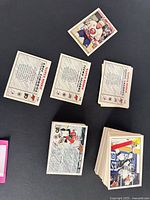 Stacks of early-1990s Super Rookie hockey cards; Eric Lindros back visible