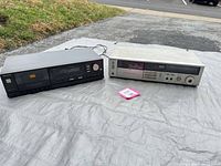Both Technics cassette decks side by side on tarp