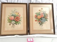Both framed bouquet prints side by side