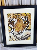 Full view of framed tiger face painting