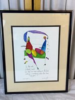 Full view of framed artwork showing entire piece and frame