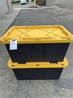 Two stacked Greenmade bins with lids