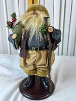 Full view of Santa figurine on base