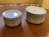 Stack of salad plates and side plates showing quantity