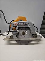 Front view of Black & Decker circular saw showing blade and guard