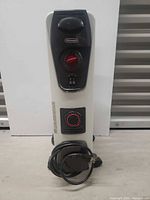 Front view showing heater, control panel and cord