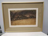 Full view of framed painting in gold frame