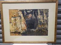 Full view of framed painting with mat and frame visible