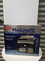 Front of sealed Staples Mailmate M5 shredder box