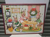 Front view of framed padded fabric picture showing full bunny Christmas scene