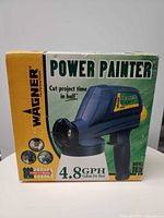 Front of box showing Wagner Power Painter Model 165 image and 4.8 GPH rating