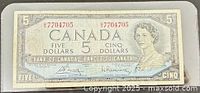 Obverse of 1954 Canadian $5 banknote in sleeve