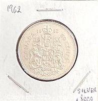 Reverse side showing Canadian coat of arms and date 1962