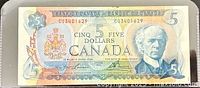 Obverse of 1972 Canadian $5 note showing portrait, serial number CU3101629