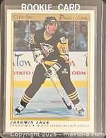 Front view of 1990-91 O-Pee-Chee Premier Jaromir Jagr rookie card in protective sleeve