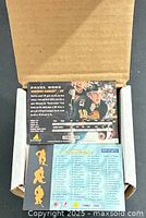 Open box showing front card (Pavel Bure) and checklist card