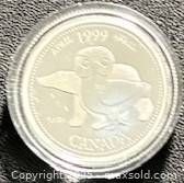 Reverse of 1999 April Millennium 25-cent coin in capsule