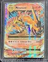 Front of Mega Charizard EX holographic card showing artwork, stats and set number 13/108