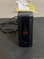 Front view of APC Back-UPS 1500 showing brand logo and control buttons