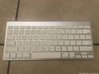 Top view of entire Apple Wireless Keyboard showing key layout