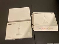 Three ClixAroma Essential Oil Aroma Diffuser boxes on table