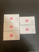 Front view of five sealed Steam Originals shower steamer boxes