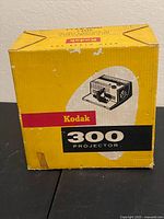 Yellow Kodak box labeled 300 Projector