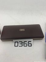 Closed Cross case showing brand logo