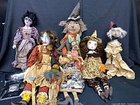 Group shot of all five Halloween dolls