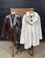 Both jackets hanging, full view