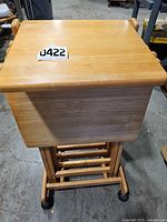 Top view of wooden stand with lot number visible