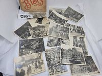 Group shot of all loose WWI postcards and Blois booklet spread out