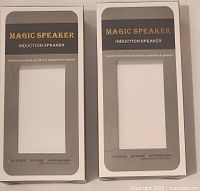 Front view of two boxed Debco Magic Speaker CU6652 units