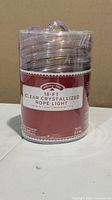 Front of sealed Holiday Time 18-ft clear crystallized rope light package