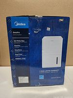 Retail box front showing brand, model, capacity, ENERGY STAR and warranty