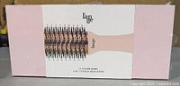 Sealed retail box showing image of L'ange Le Volume 60 mm 2-in-1 titanium brush dryer