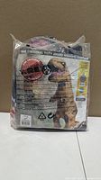 Front of packaged Rubie's inflatable T-Rex costume showing branding and instructions