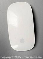Top view of Apple Magic Mouse showing overall condition