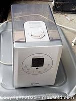 Front angled view of Levoit ultrasonic cool mist humidifier showing tank, base, and control panel