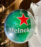 Front side of Heineken illuminated sign