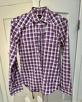 Front view of BOSS Hugo Boss purple-white plaid shirt on hanger