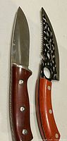 Both knives side by side showing handles and blade shapes