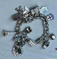 Full bracelet showing chain link and charms layout