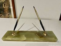 Entire desk pen set: two pens mounted on green marble base