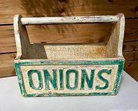 Side view showing ONIONS lettering