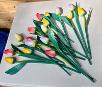 Group of wooden tulip flowers on table