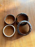 All four bangles grouped to show sizes and finishes