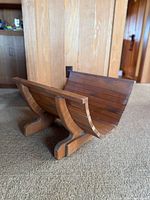 Three-quarter view showing full holder on supports