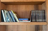 Shelf showing assorted books left and Old West series right