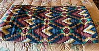 Comforter folded showing primary Southwestern diamond pattern